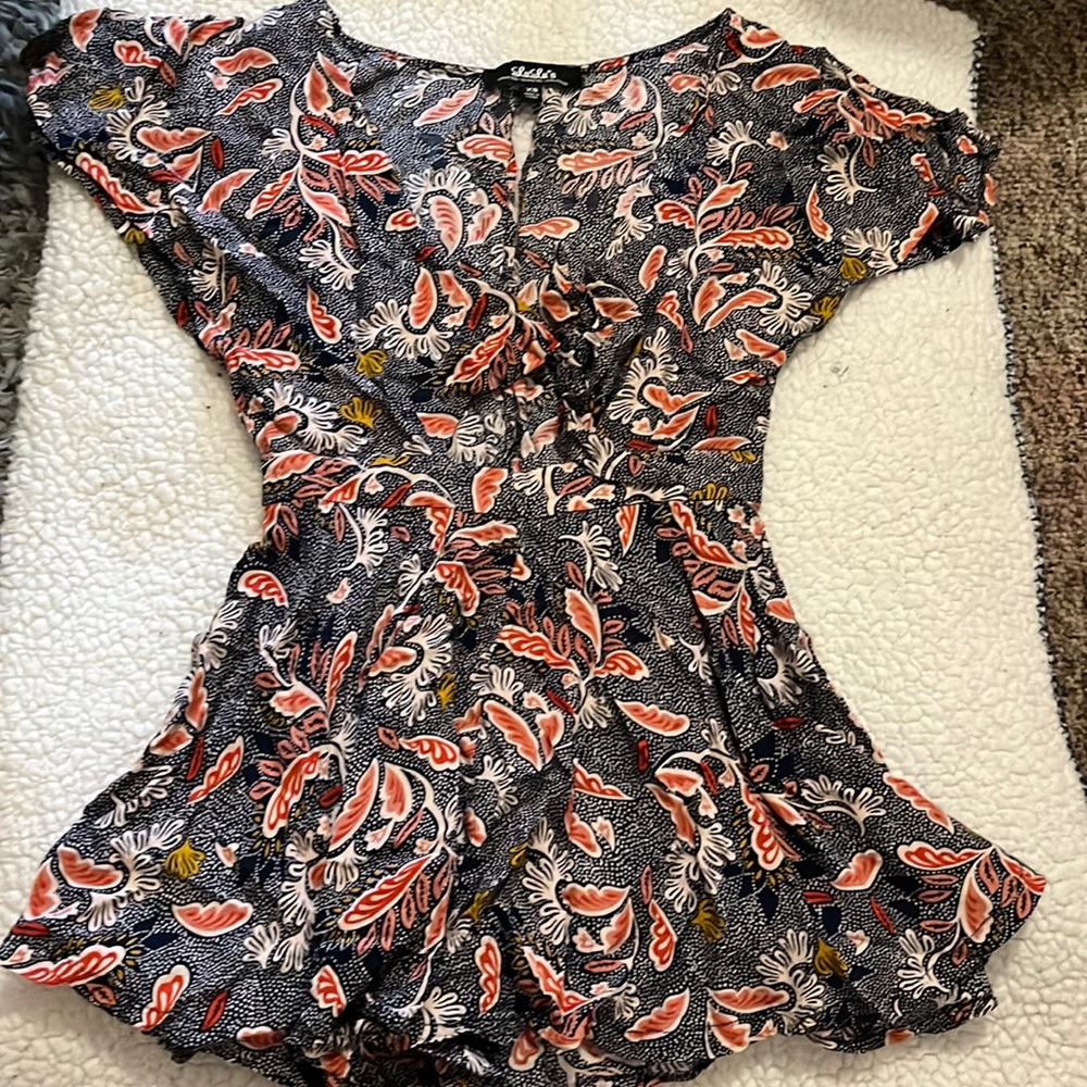 Brand new Lulu’s romper. Size XS.